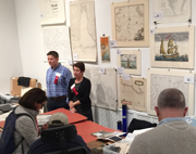 Justin Baker and Dedra Ashman answer visitors' questions at the 2016 Miami International Map Fair.